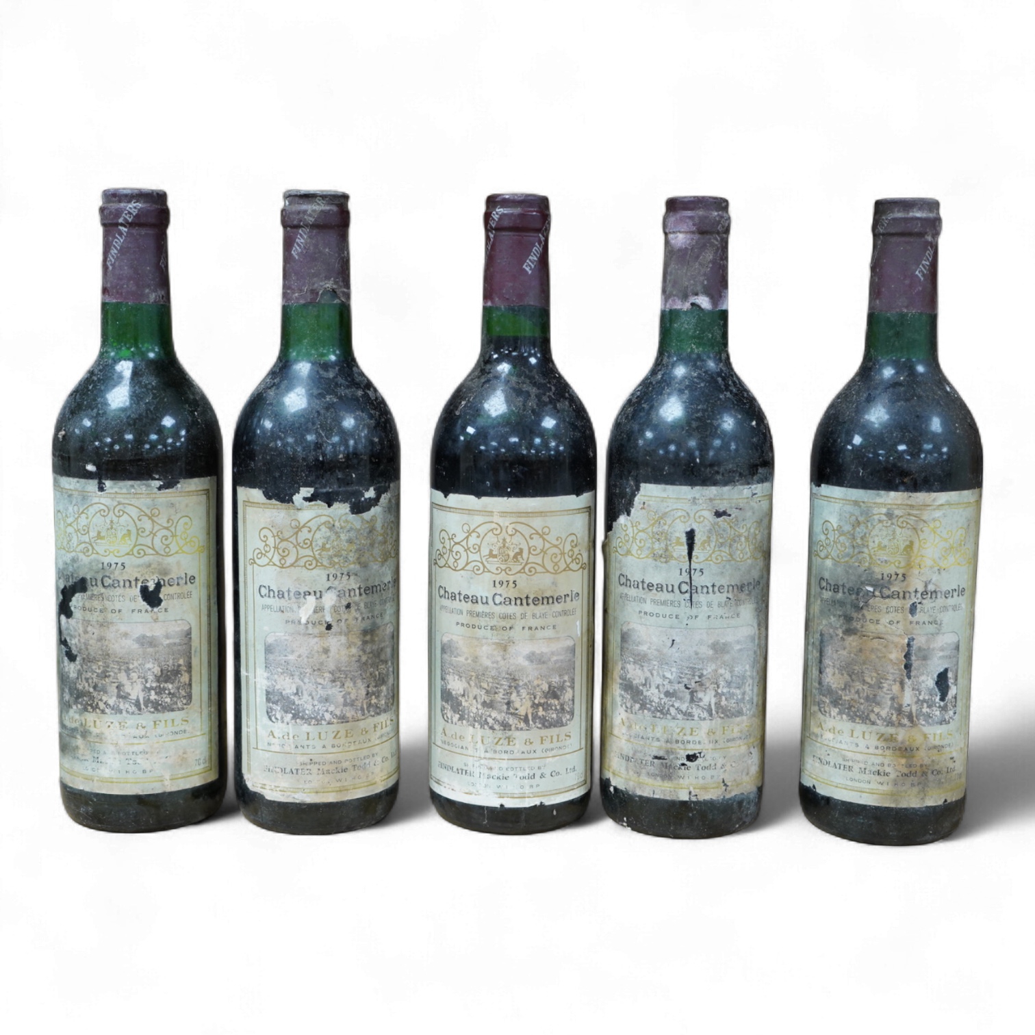 Five bottles of Chateau Cantemerle, 1975, labels degraded